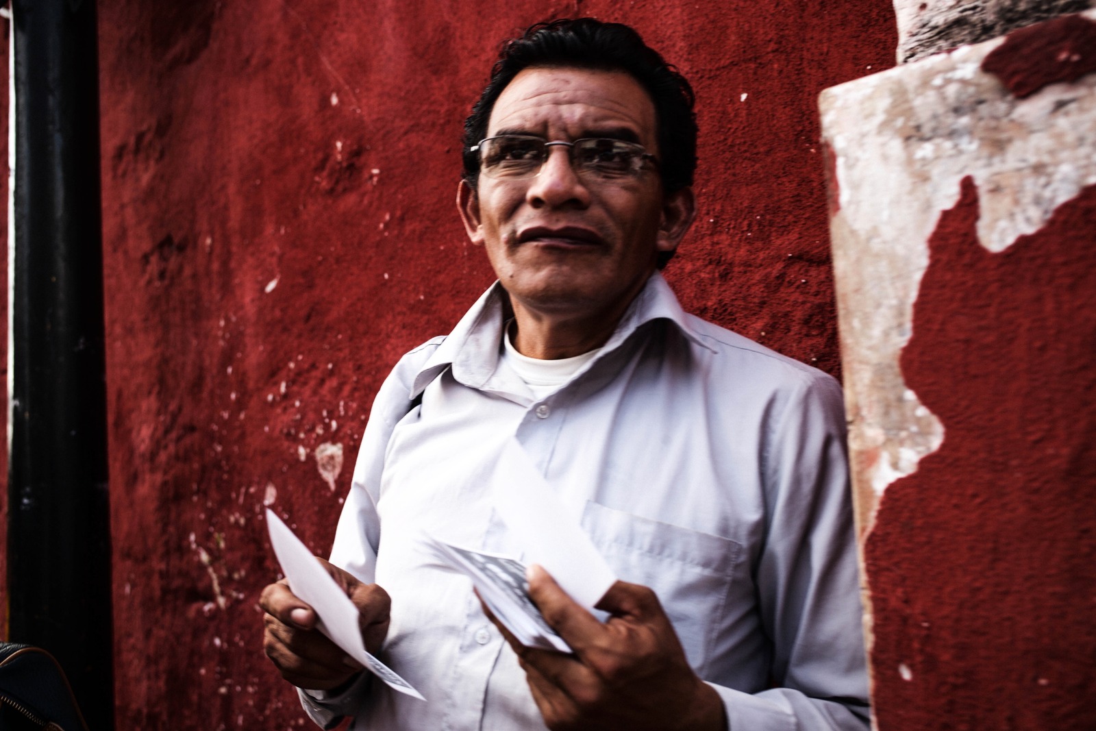 Contemplation Against Crimson Walls