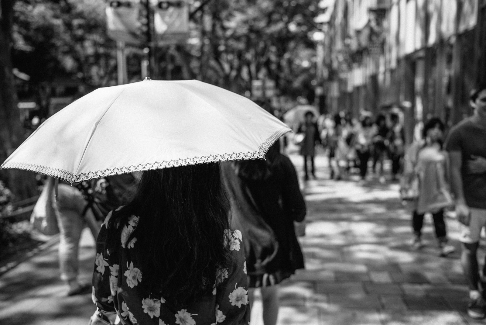 A Lone Figure in the Crowd