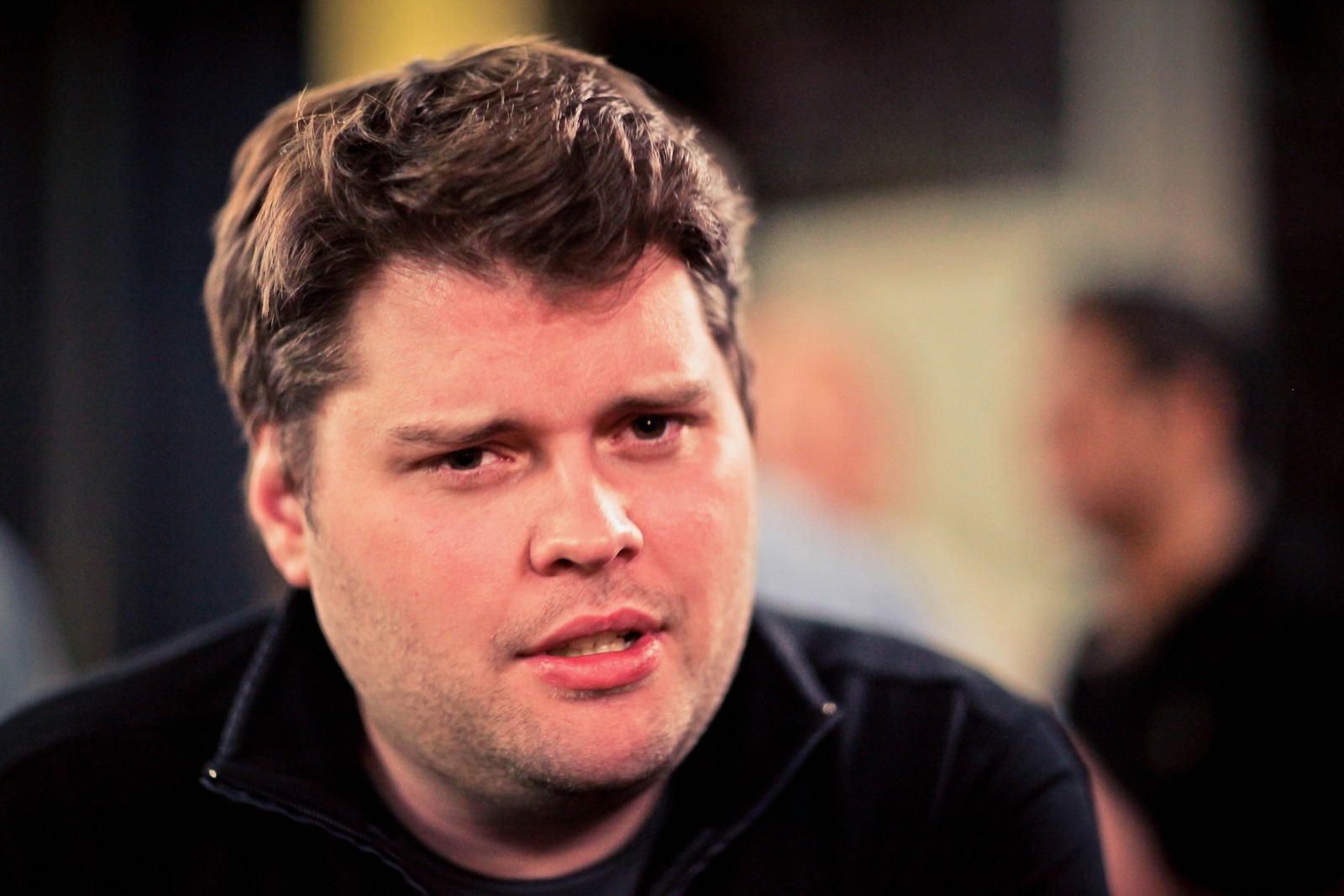 Intense Conversation in Shadows