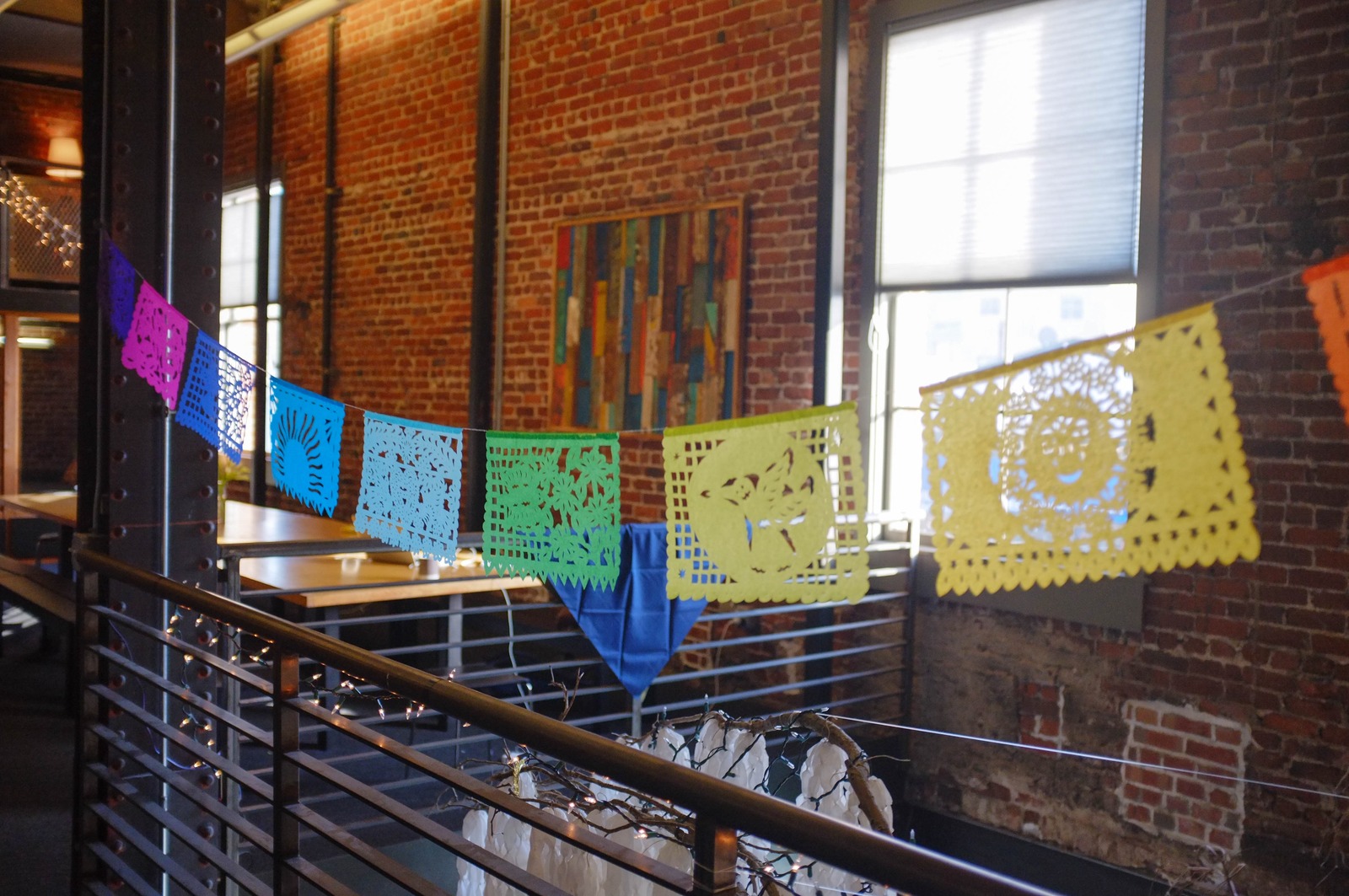 Colorful Banners in a Rustic Space