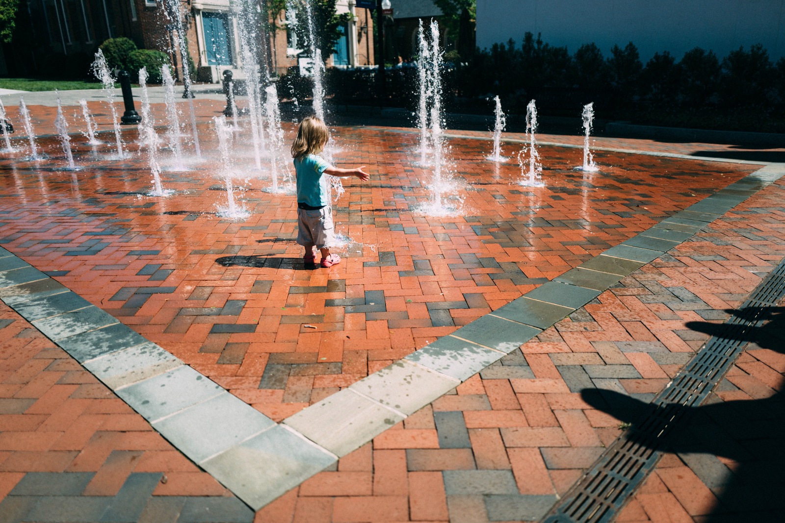 Joyful Play in the Fountain