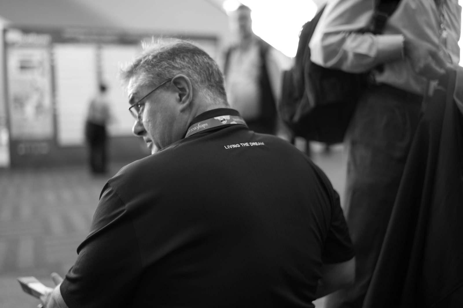 Contemplative Moment in a Crowd