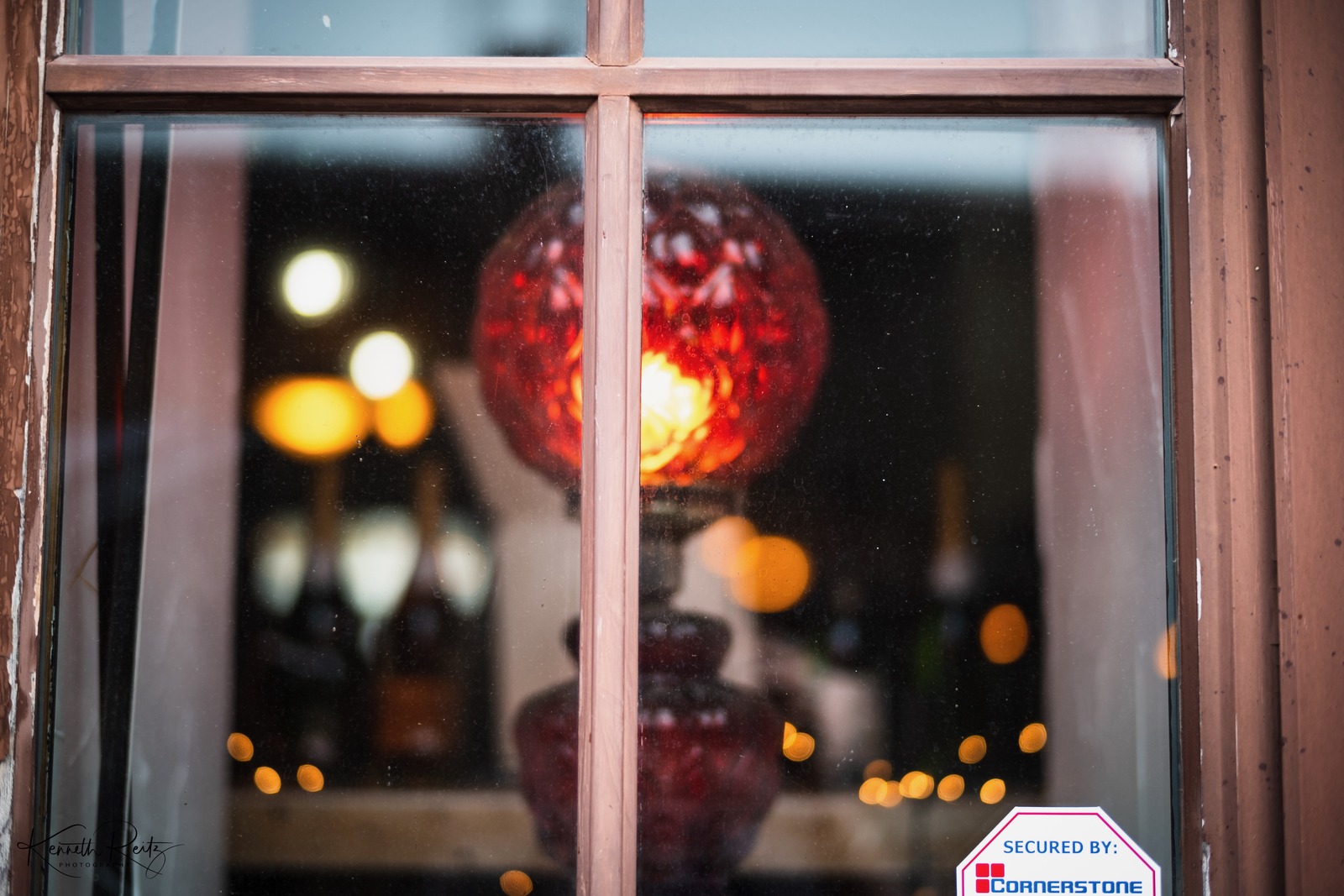 Glimmer Behind Glass