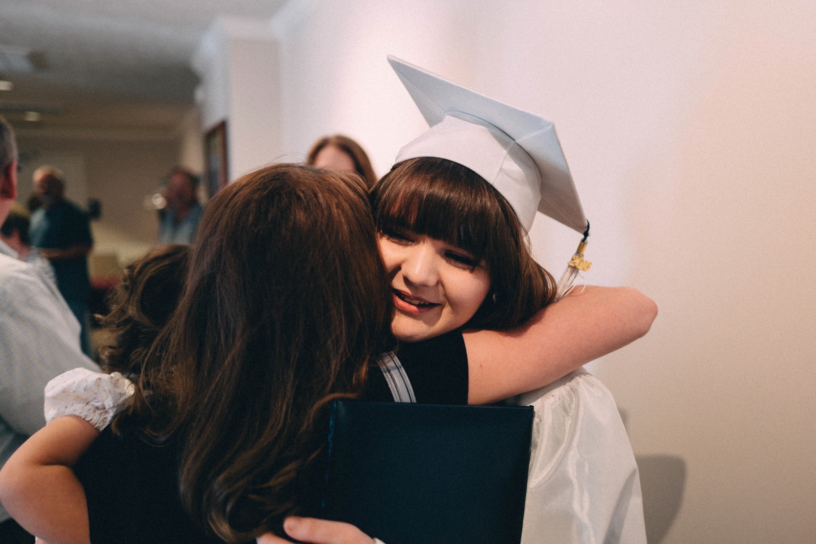 Joyful Graduation Embrace