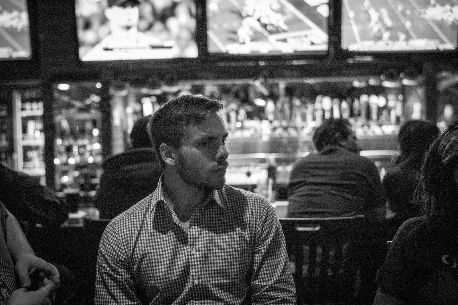 Contemplative Moment in a Bar