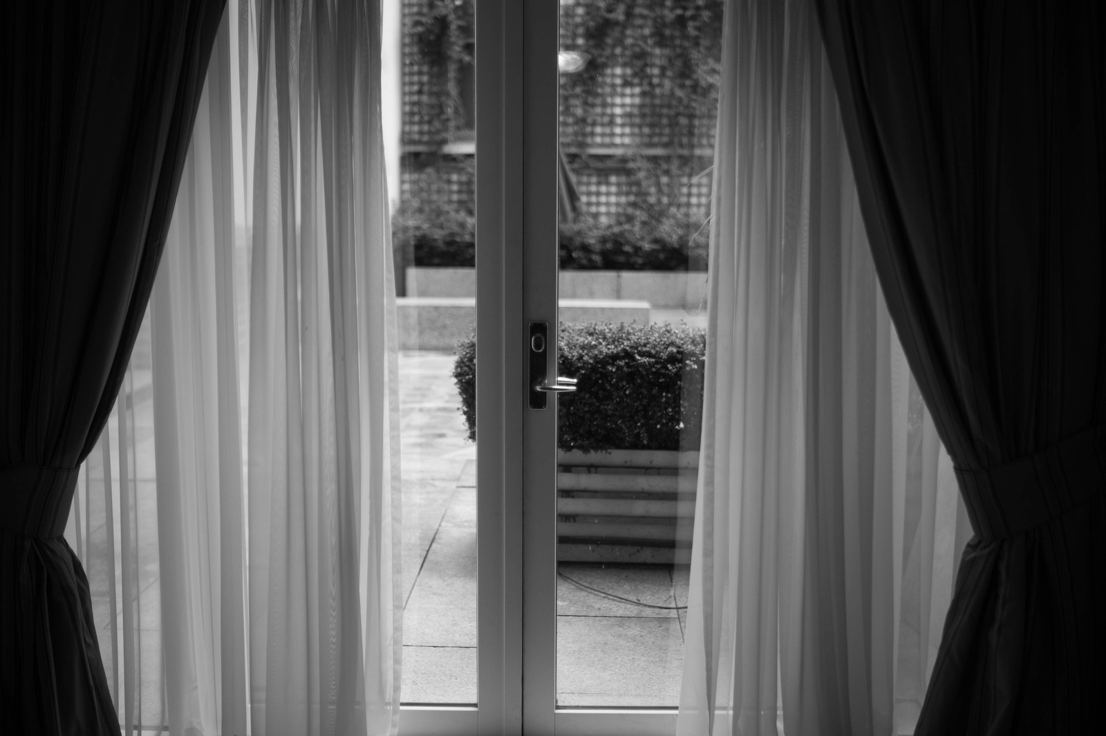 Through the Veil of Curtains