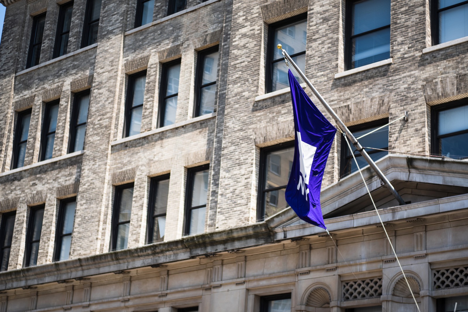 Urban Flag Amidst Stone