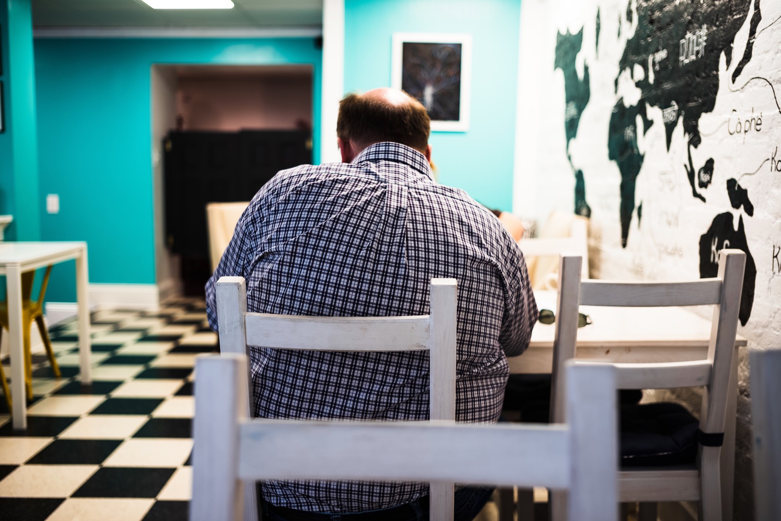 Solitude in a Colorful Café