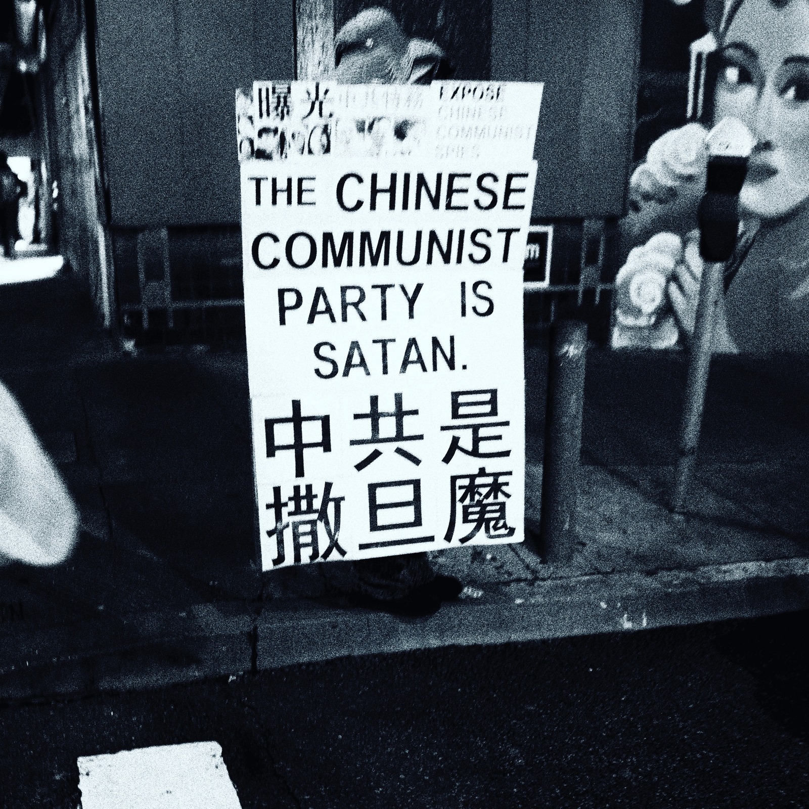 Protest Sign in Shadows