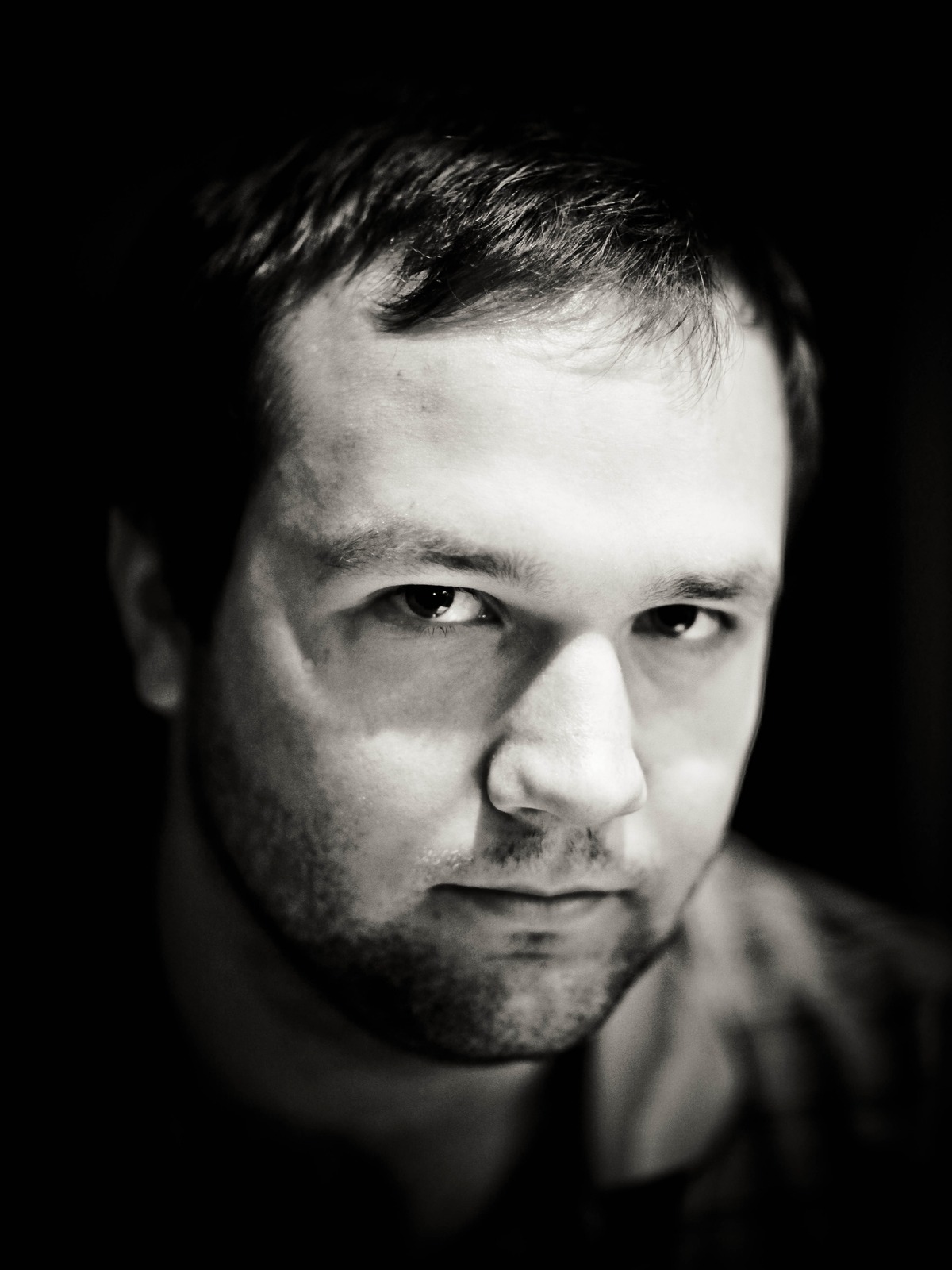 Intense Gaze in Shadows