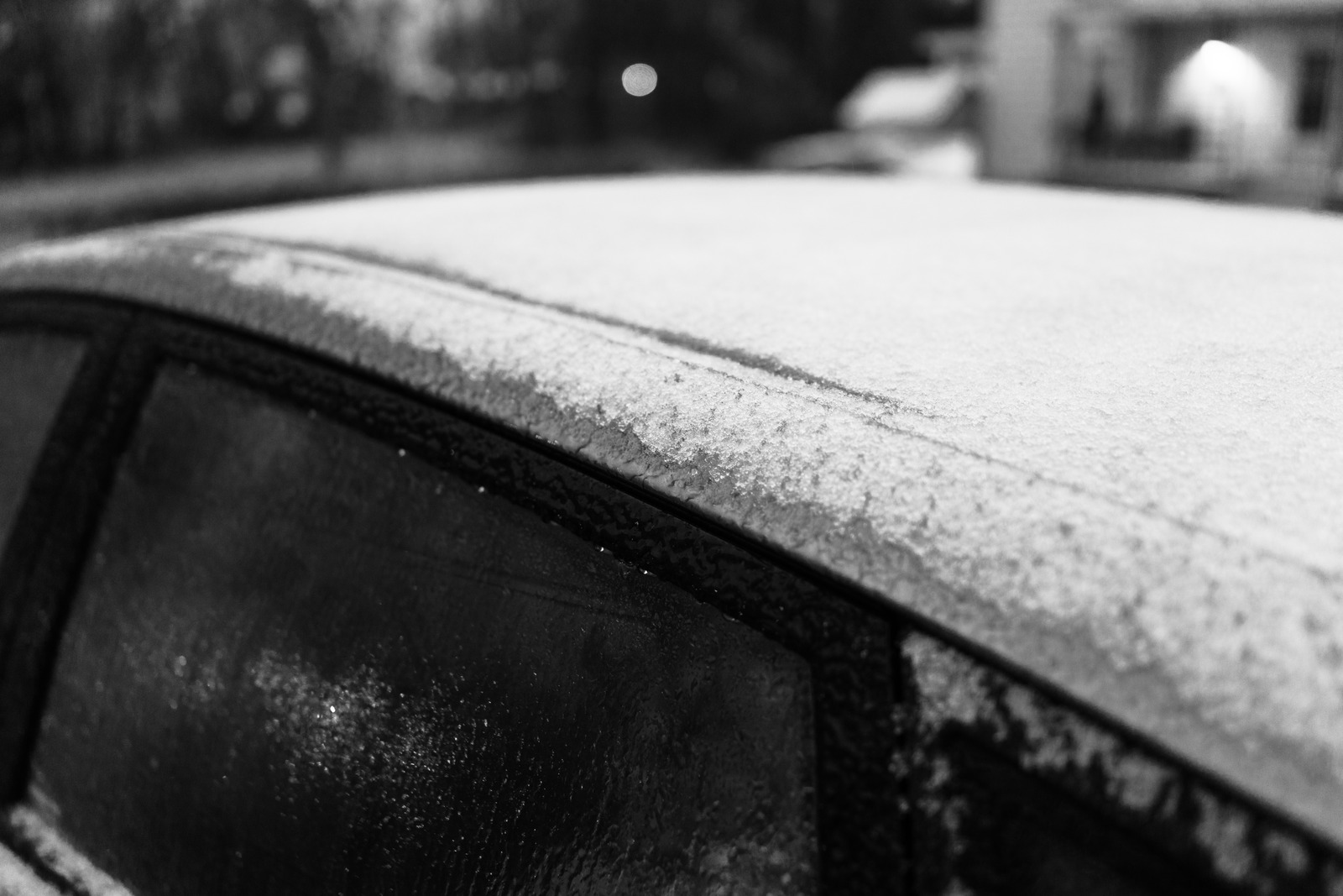 Winter's Veil: A Frosted Car