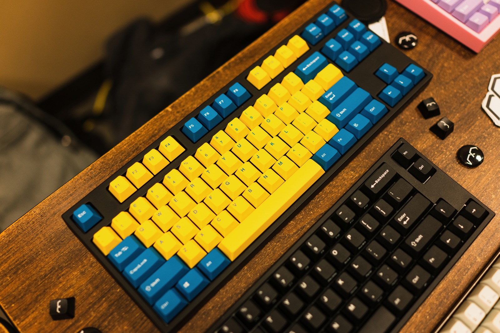 Colorful Keyboards on a Desk