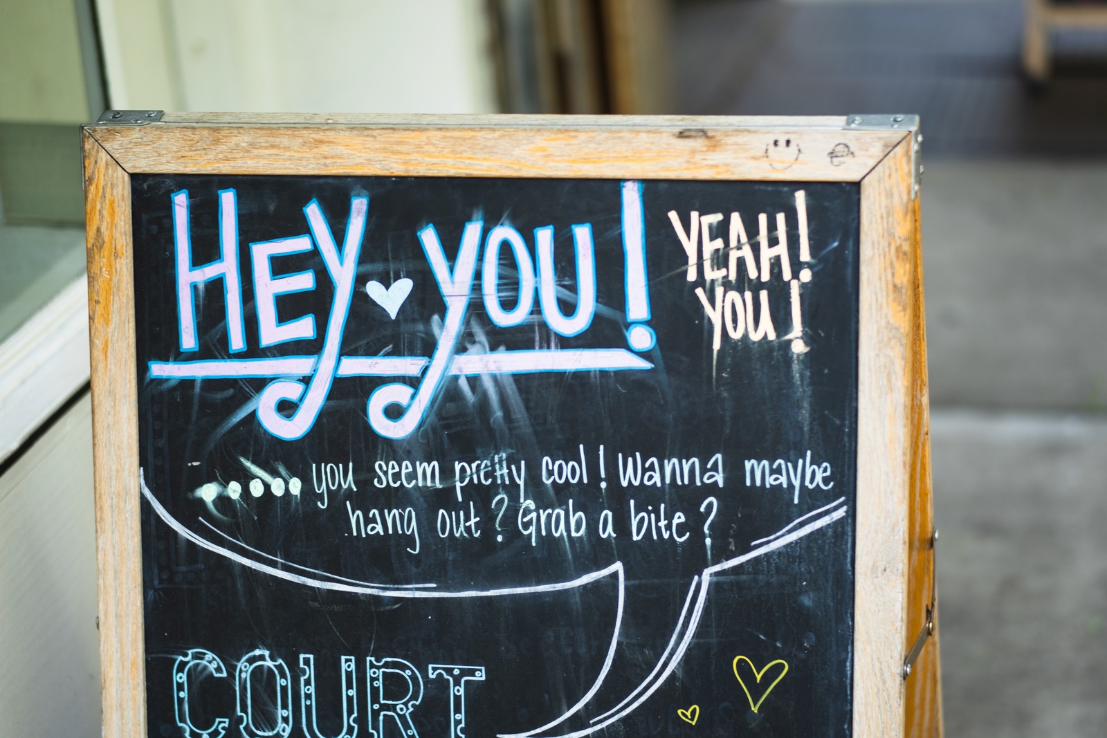 Inviting Words on a Sidewalk