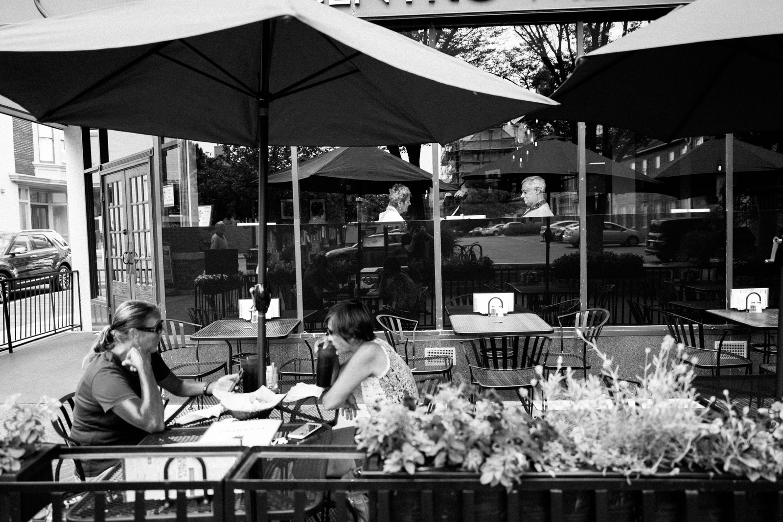 Café Conversations in Shadows