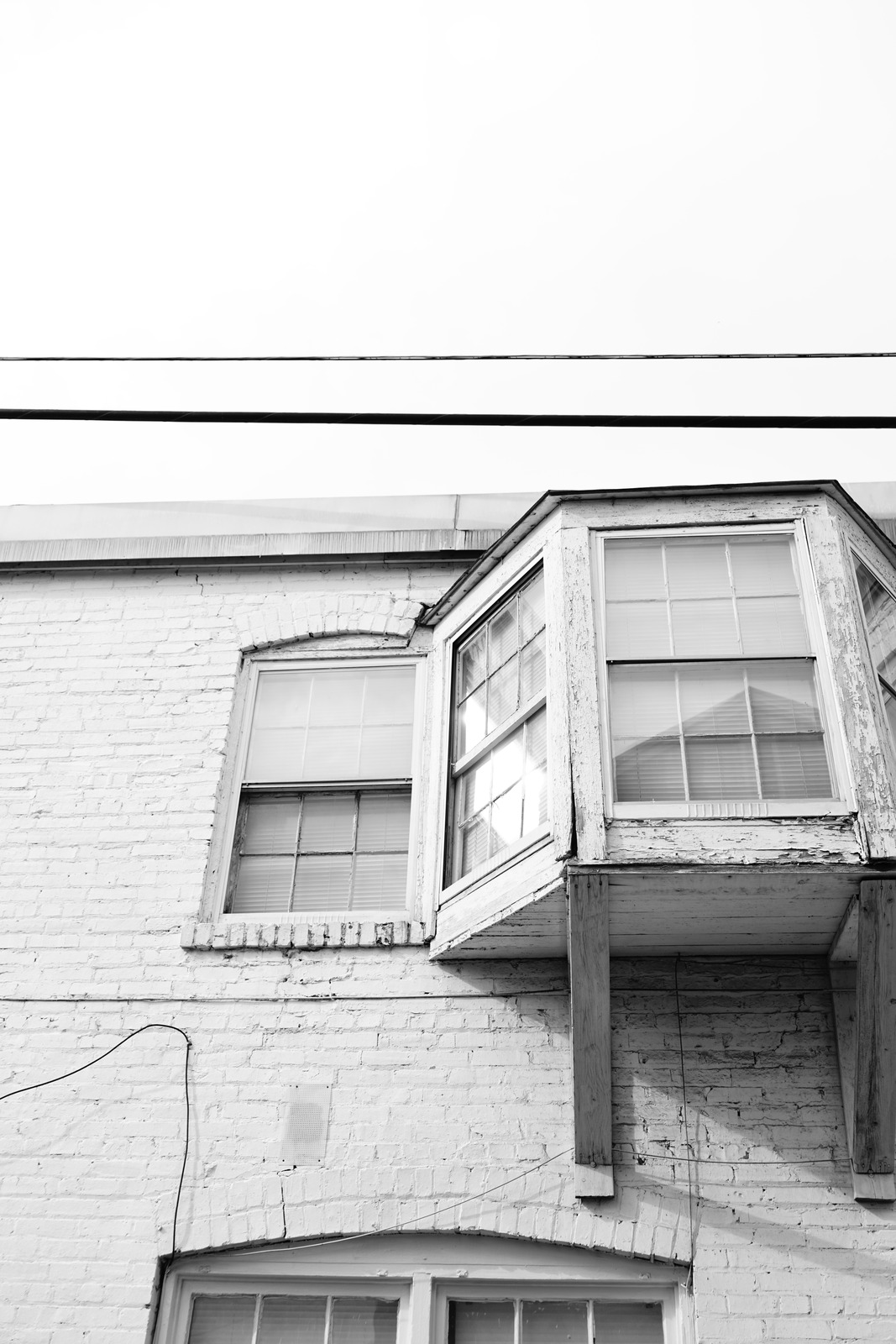 Weathered Windows and Empty Skies