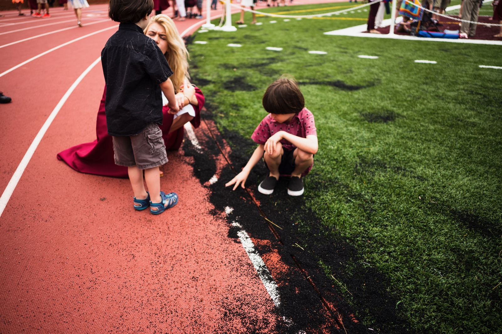 Youthful Curiosity on the Track