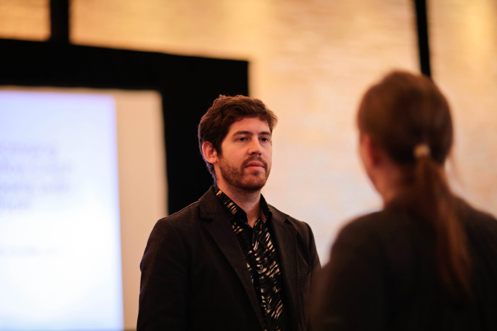 Intense Conversation in Soft Light