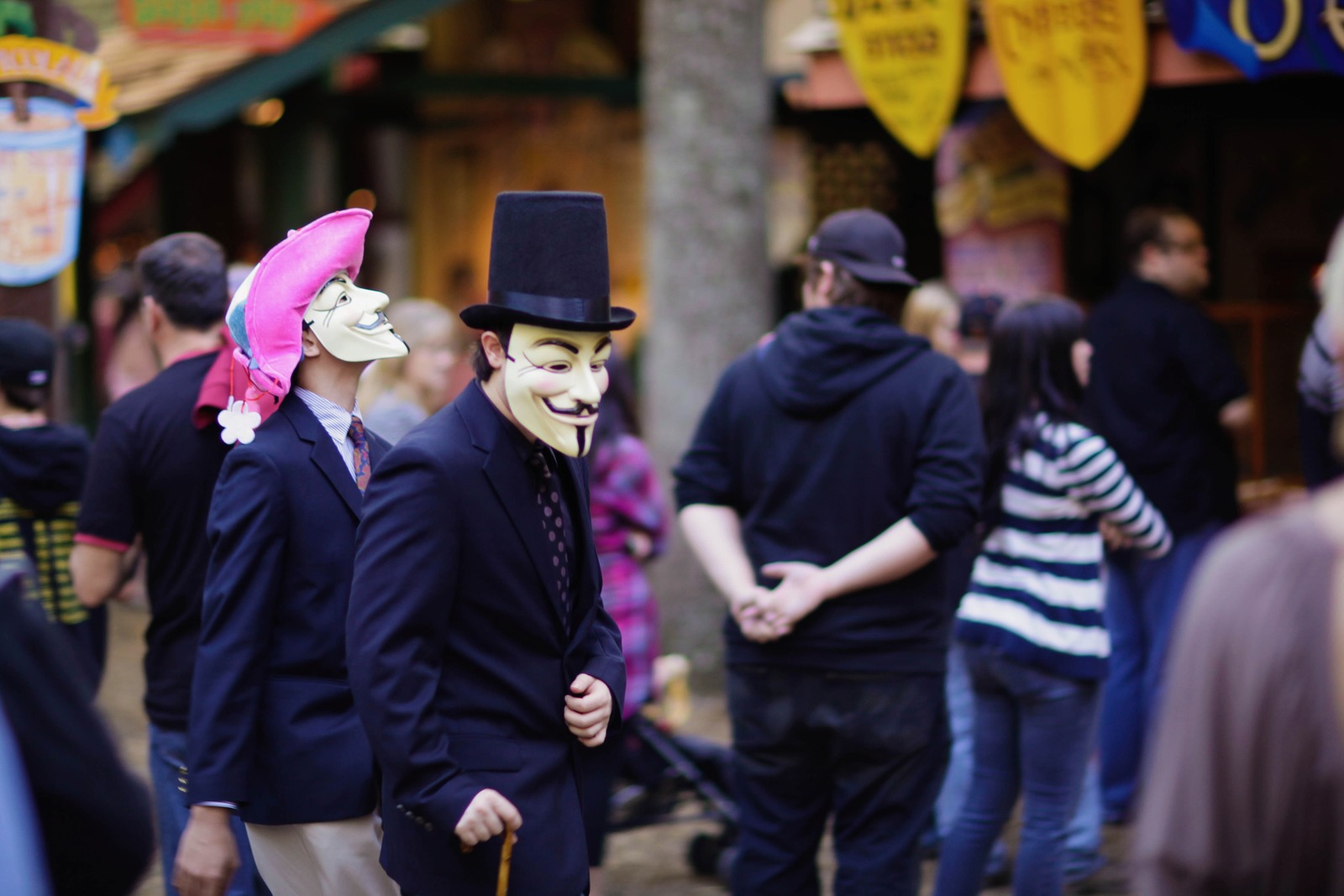 Masked Figures in a Crowd