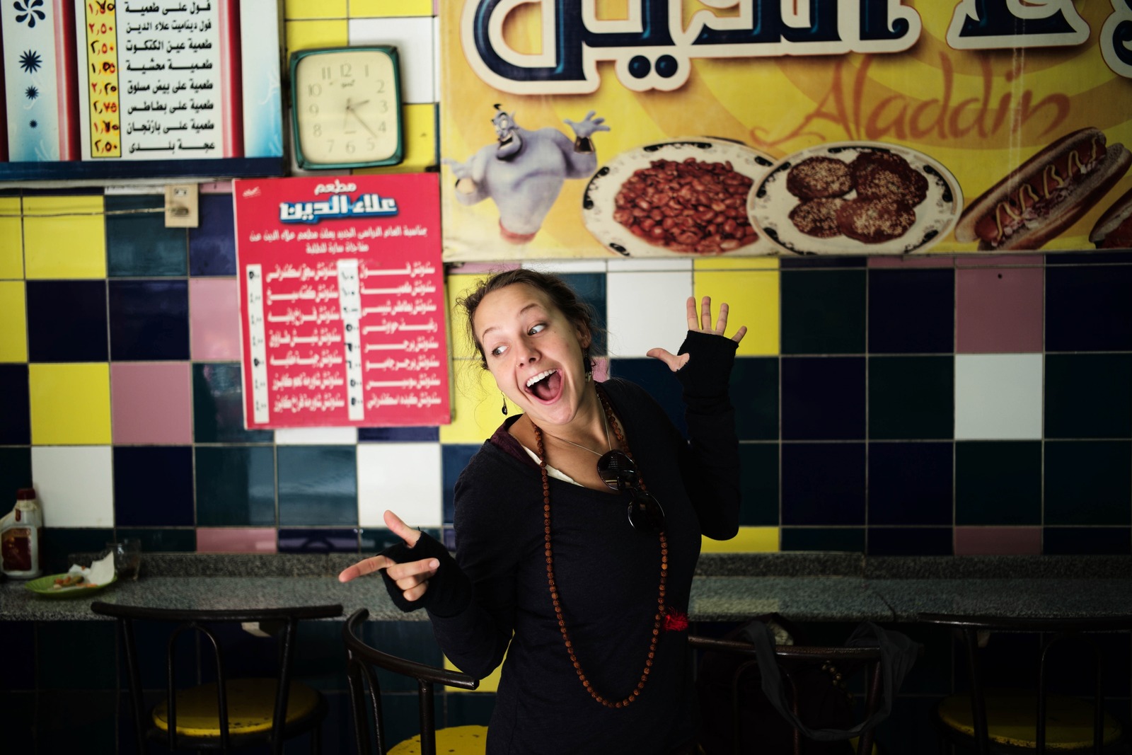 Joyful Expression in a Colorful Eatery