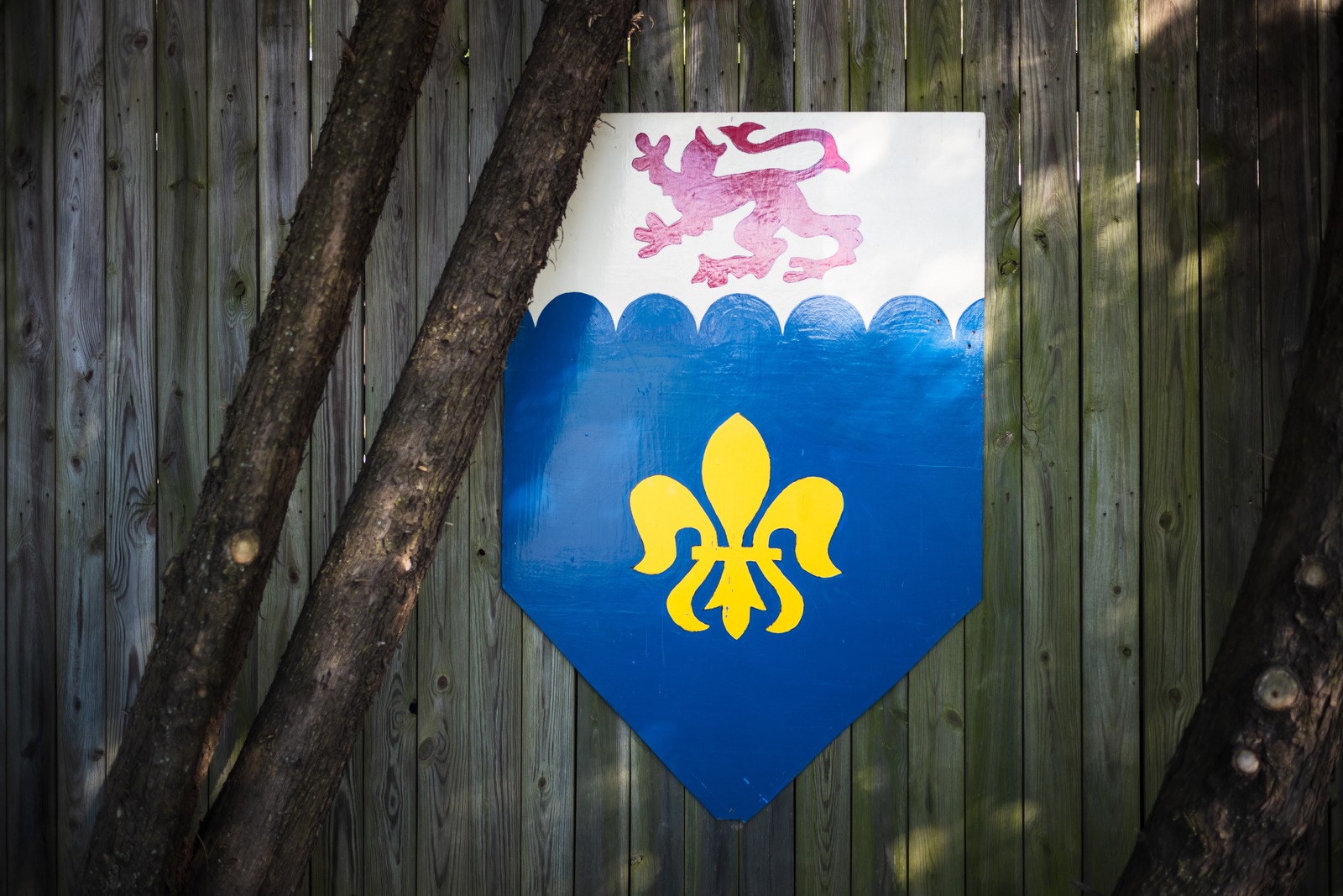 Heraldic Emblem Amidst Nature