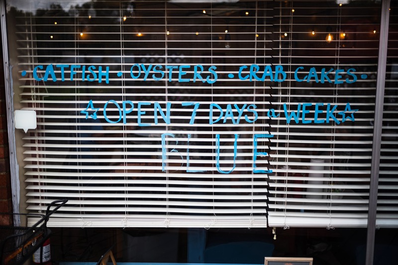 Beneath the Blue Sign