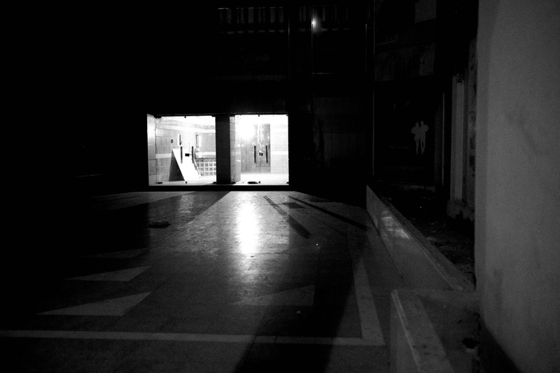 Lone Entrance in Shadows