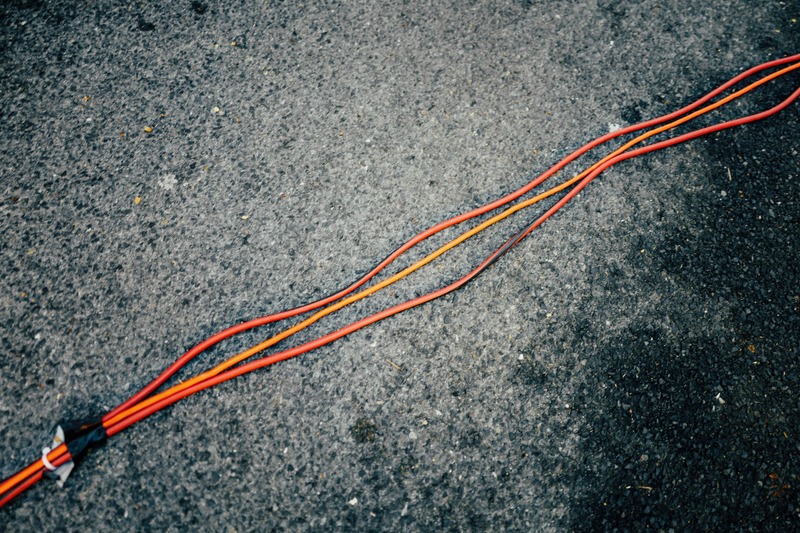 Tangled Lines on Asphalt