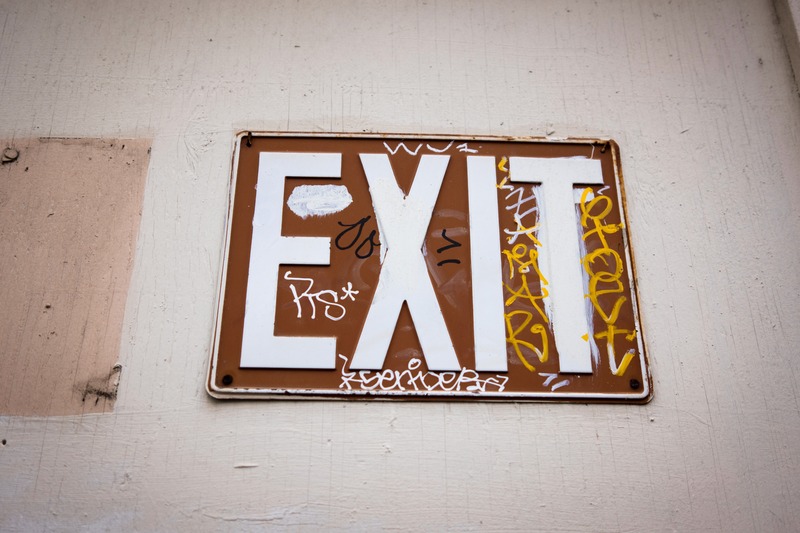 Urban Exit Sign with Graffiti