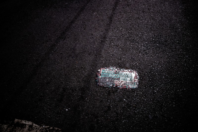 Forgotten Sign on Asphalt