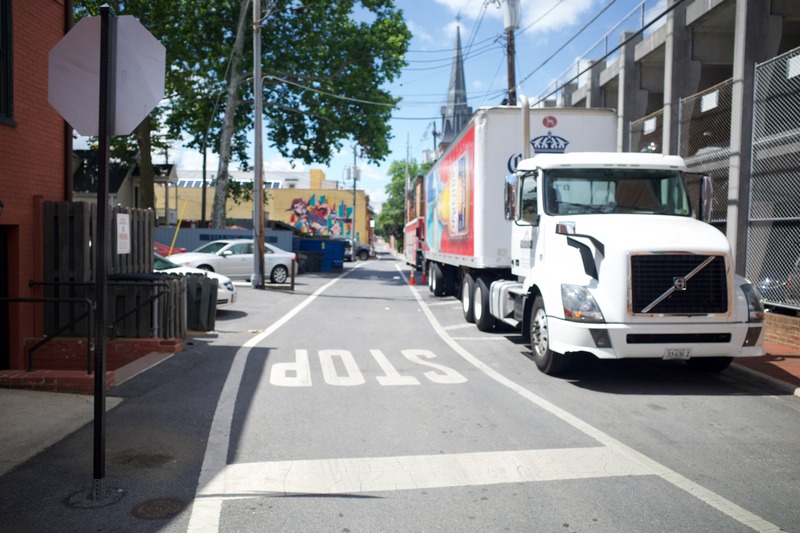 Urban Alleyway with Trucks