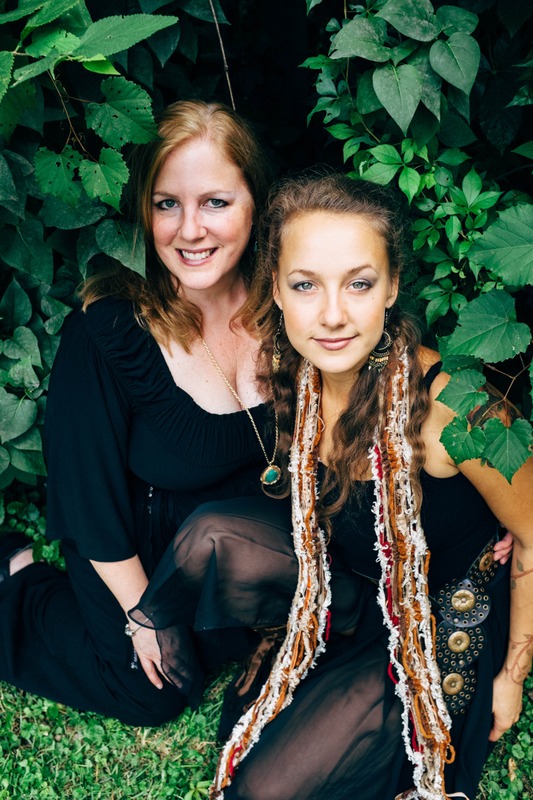 Elegant Duo Among Greenery