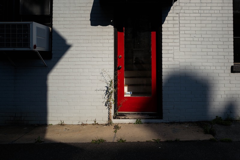 Red Door in Shadows