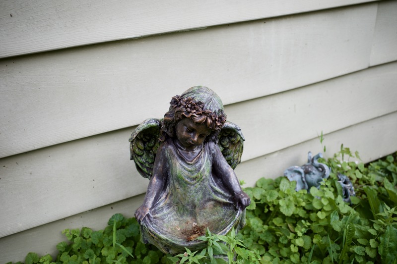 Forgotten Angel by the Garden