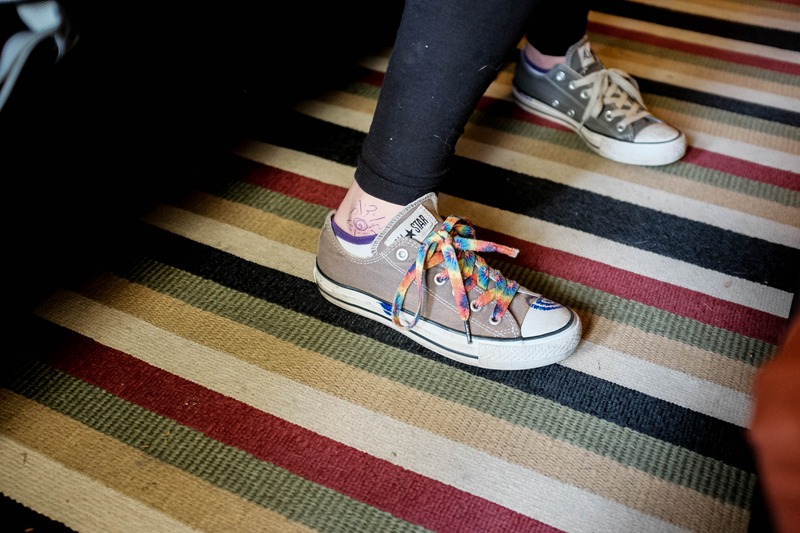 Colorful Soles on Striped Floor