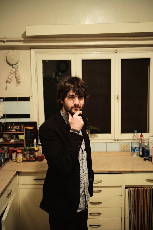 Pensive Reflection in the Kitchen