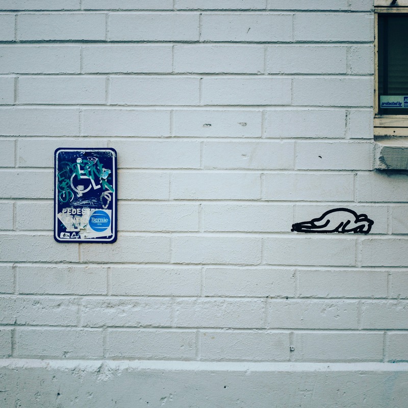 Urban Whimsy on Brick Wall