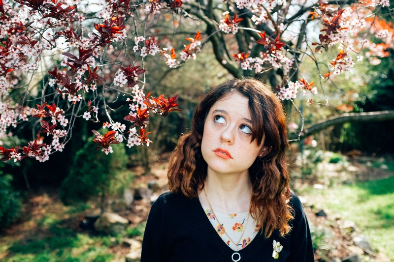 Contemplation Beneath Blossoms